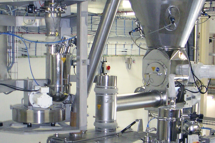 Coperion K-Tron feeders over mixer in infant formula application